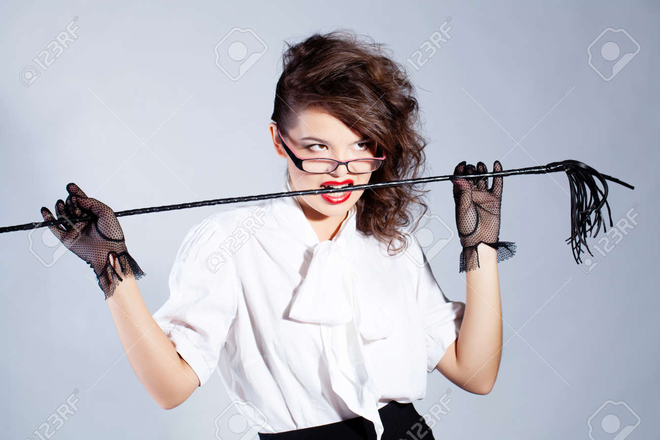 15325096-strict-teacher-with-glasses-and-a-whip.jpg