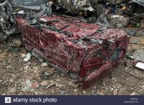 crushed-cars-in-scrap-yard-uk-DTBTKE.jpg