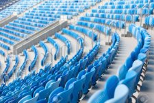 84468636-rows-of-blue-seats-at-football-stadium-convenient-sitting-for-all-.jpg