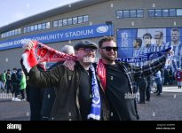 fans-outside-the-stadium-with-mixed-scarves-before-the-premier-league-match-between-brighton-and.jpg
