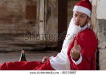 stock-photo-drunken-santa-showing-middle-finger-85299067.jpg