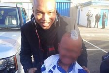 Diouf and child-1516158.jpg