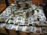 piles-of-money.png