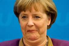 Angela-Merkel-grimaces-as-she-addresses-a-press-conference-following-a-poor-showing-by-her-Chris.jpg