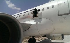Plane bomb hole.jpg Plane bomb hole.jpg