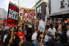 Protesters-march-along-Notting-Hill-Gate.jpg