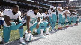 arian-foster-dolphins-national-anthem-kneel.jpg