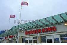 burger-king-restaurant-with-flags-on-flagpoles-brighton-seafront-uk-cygjf5.jpg
