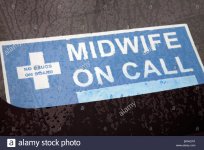 midwife-nurse-on-call-sign-on-windscreen-of-car-london-BFWCRT.jpg