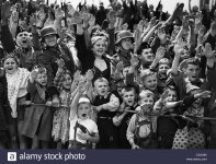 german-children-and-soldiers-give-the-nazi-salute-during-parade-CXGA65.jpg