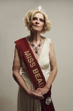 senior-woman-wearing-tiara-and-beauty-queen-sash-in-studio-portrait-philipp-nemenz.jpg